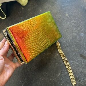 ASOS design multi colored, gold, clutch. Worn once like new.